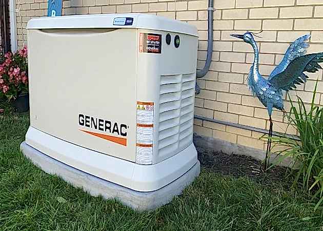 Generac generators in Dayton, OH Yard side next to residential home in Dayton, OH