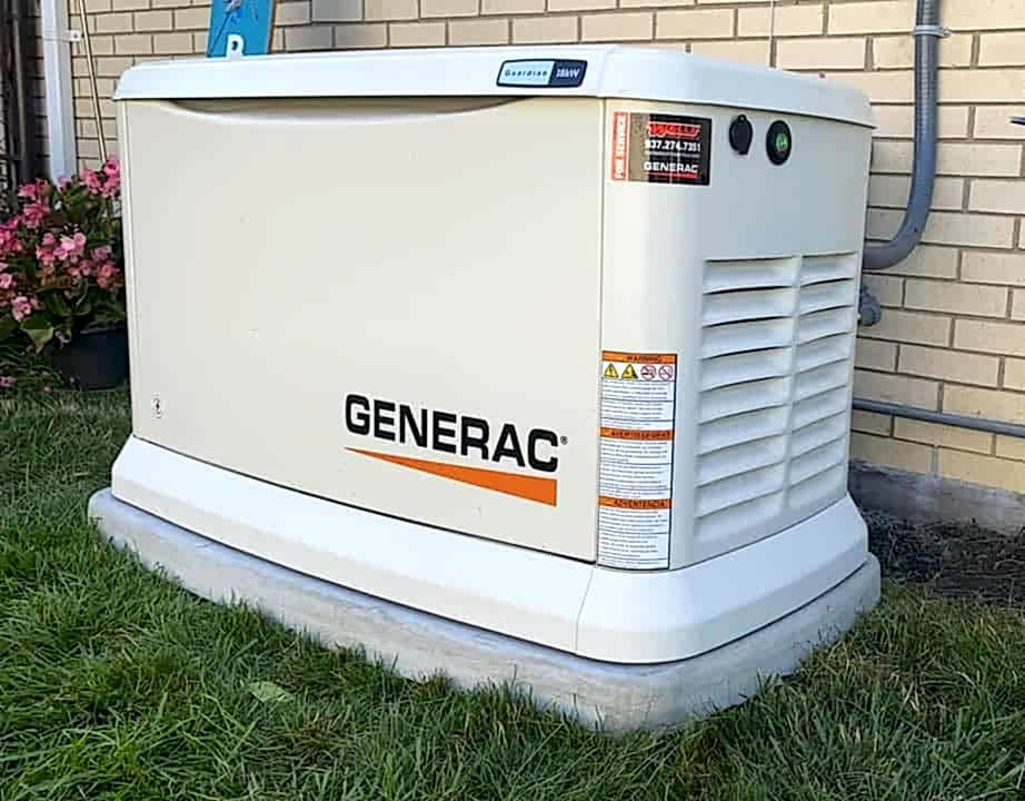 generator size Generac generator installed next to brick building